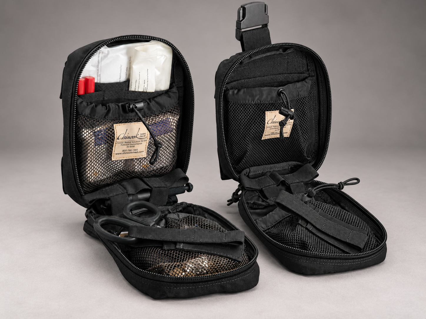 Two open black Chinook medical pouches, one stocked with medical supplies and one showing its empty organizational compartments